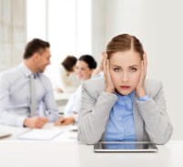 26692259 - business, technology, internet and office concept - stressed businesswoman with tablet pc computer