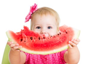 baby eating watermelon